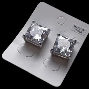 Fashion diamond magnet earrings. Large diamond.